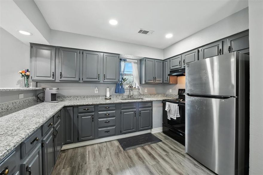 ASK ABOUT LENDER INCENTIVE. Charming country feel in the heart of the city! Welcome home to this adorable 3-bedroom, 2-bathroom single-story gem, offering 1,208 square feet of comfortable living space on a generously sized lot. Tucked away in a peaceful setting with established trees, this property gives you that serene country feel—all while being conveniently located in the city.

Inside, you'll find an open-concept layout connecting the kitchen, dining, and living areas—perfect for entertaining or cozy nights in. The kitchen features granite countertops, stylish vinyl plank flooring throughout, and the refrigerator will convey with the home. The home is also equipped with solar panels, offering energy efficiency and cost savings.

Step outside to a large backyard with plenty of space to relax or play, plus a small shed for extra storage. An extended driveway provides ample parking for guests or extra vehicles.

Don’t miss this rare blend of space, comfort, and location—schedule your showing today!