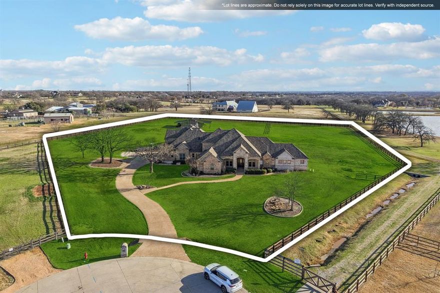 Located within one of the area’s most established and desirable equestrian communities, this fenced acreage property offers a rare opportunity to own usable land, a finished residence, and a partially constructed custom estate with plans included for completion by the next owner.
The property features a beautifully finished 2,613 square foot residence that is fully complete and move-in ready. The home includes vaulted ceilings with wood detail, expansive windows capturing pasture and pond views, a fireplace with built-ins, wide-plank flooring, a custom kitchen with stainless appliances and oversized island, and a well-appointed primary suite with walk-in shower. An upstairs flex space provides additional living, office, or media use. This residence can comfortably function as a primary home, multigenerational quarters, or on-site living while future construction is completed.
In addition to the finished home, the property includes a separate 5,327 square foot custom main residence that is currently framed and under roof. The structure showcases significant architectural scale, dramatic ceiling heights, expansive window openings, and a courtyard pool concept. The home is being sold in its current state of construction and will not be completed by the seller. Architectural plans and related materials will be conveyed to the buyer, allowing the next owner to complete the residence according to their own timeline, budget, and finish selections.
The grounds include fully fenced and usable pasture, an established horse barn, open green space, and views of a stocked pond. Surrounding properties are estate in nature, reinforcing the long-term value of acreage ownership within this community.
This offering presents a unique opportunity to secure land, infrastructure, and a substantial head start on a custom estate without beginning from raw land. The existing finished residence provides immediate livability while the main home is completed by the next owner.