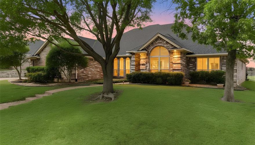 Welcome to this beautifully maintained custom home nestled on a premium oversized lot in the highly desirable Lost Creek Hollow subdivision.  With 2919 square feet, this 4-bedroom, 3.5-bath residence offers privacy, breathtaking views of rolling hills, and land that was previously part of the Lost Creek Hollow Golf Club, and currently provides tons of greenbelt spaces throughout the neighborhood to enjoy. Built in 2000 by custom builder William Horn, this all-electric home blends timeless craftsmanship with major recent updates. The seller has invested heavily in improvements including all new windows & new LVT Flooring in the Guest Suite in 2025, A new roof & new gutters in May 2024. The HVAC system was serviced (Oct 2025, including a new 5-ton condenser and all filters were replaced. Three 50-gallon hot water heaters recently replaced, 2025, 2024 & 2010 (All have pans and alarms), offering efficiency and peace of mind.The oversized 3-car garage provides ample storage and parking. (Garage Doors were serviced June 2025.
A whole-home generator powered by propane and serviced annually conveys with the property, along with the security system and cameras.
Inside, you’ll find custom plantation shutters throughout,  spacious living areas  and thoughtful design elements that make this home both functional and inviting.  A fabulous private suite or flex room w private entry, sink, refrigerator & curbless shower provides many options: guest suite, gameroom, additional bedroom, multi-gen etc...Convenient kitchen w beautiful granite Countertops Island and a HUGE  walk-in pantry Enjoy serene views, generous space, and the quiet charm of Lost Creek Hollow — Located Conveniently Between Ft Worth & Aledo with Fort Worth ISD.
This is Texas Living!