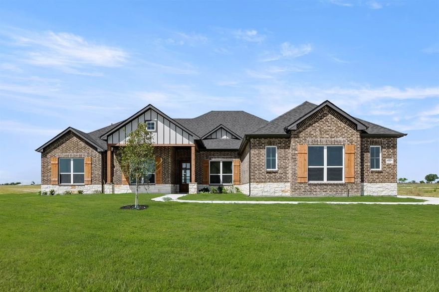 Welcome to 270 Maci in Waxahachie—an exceptional new construction home perfectly positioned on 1.02 acres, offering refined living with the tranquillity of a private, country setting.
Spanning 2,803 square feet, this beautifully crafted 4-bedroom, 2.5-bath residence showcases thoughtful design, elevated finishes, and a seamless blend of style and functionality. A dedicated home office provides the ideal space for remote work or a quiet retreat.
The expansive open-concept living area is filled with natural light and designed for effortless entertaining, flowing into a chef-inspired kitchen featuring an oversized island, abundant cabinetry, and generous workspace. Every detail has been carefully considered to create a space that is both elegant and inviting.
The private primary suite serves as a luxurious escape, complete with a spa-like ensuite bath and spacious walk-in closet. Secondary bedrooms are well-appointed and offer flexibility for family or guests.
Step outside and experience the beauty of wide-open Texas living—this 1.02-acre homesite offers endless possibilities, whether you envision a pool, shop, or outdoor living space tailored to your lifestyle.
Ideally located in Waxahachie, this property delivers the perfect balance of privacy and convenience, with easy access to local amenities while maintaining a serene, upscale atmosphere.
Experience the craftsmanship, space, and sophistication this home has to offer—schedule your private showing today.