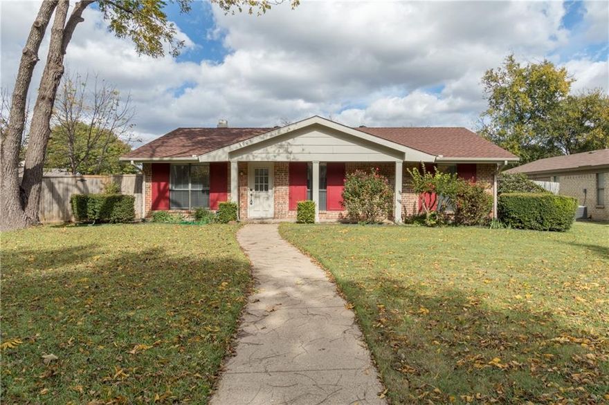 Wood look hard floors through the kitchen and living room. Large open living room and dining area with brick fireplace. Very cozy open concept floorpan. Fenced in back yard with large mature shade trees. Large two car garage provides protection from the elements and warmth for your vehicle on those cold mornings! Beautifully landscaped yard with large mature shade trees. Schools and shopping are close by as well.