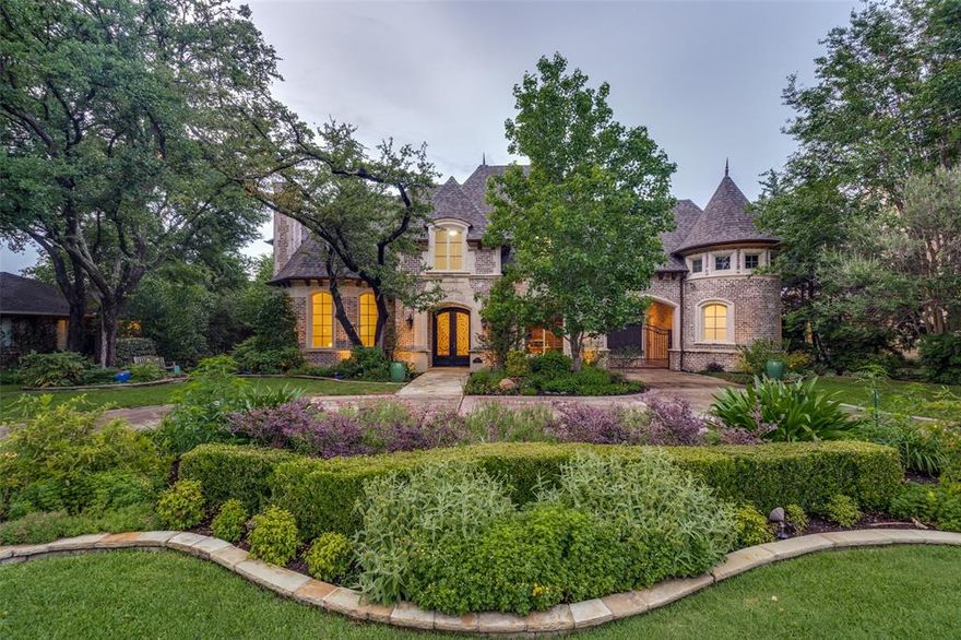 At the crossroads of luxurious living and convenient location is this Preston Hollow traditional on .43 acres. Step inside and admire the grand staircase and beautiful hardwood floors before feasting your eyes on exceptional craftsmanship and elegant design. Love to entertain? This home is for you with the 800-bottle climate-controlled wine cellar, media room, and wet bar. The outdoor oasis features a modern pool with a spa, swim jet, and water features, the perfect backdrop for hosting special events or for everyday relaxation. The primary bedroom offers dual water closets and dual closets, while the additional bedrooms and baths are spacious and well-appointed. Cozy up to any of the five fireplaces in the winter, or enjoy the Texas summer in the beautifully landscaped backyard. The home also features a 3-car garage. The private school corridor is within easy reach, as is the Dallas North Tollway, Preston Royal, and Preston Center. Schedule a showing today!