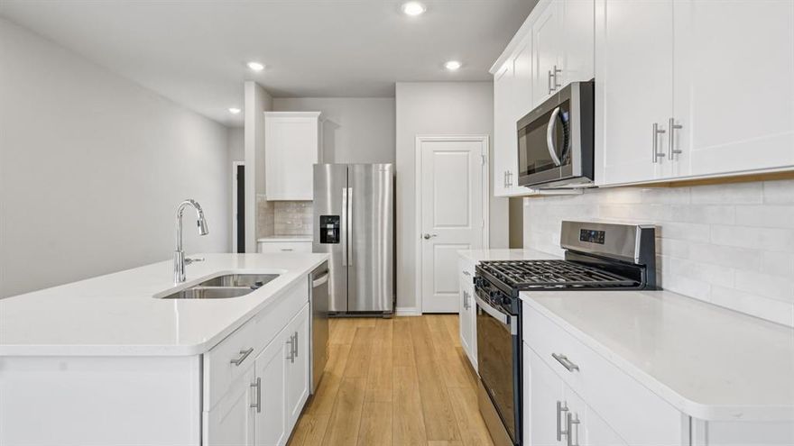 Brand new, energy-efficient home available by Nov 2025! With four bedrooms in the Carlsbad plan, you can customize the needs of your family. White cabinets with veined white quartz countertops, tan tone EVP flooring and light grey brown textured carpet. Lakehaven is a master-planned community located at the edge of Lavon Lake, featuring all of the modern amenities. Family time will turn into lake time during the warm Texas summers. The Spring Series will boast six floorplans from our National Park Collection that range in size from approximately 1,270 sq. ft. to 2,255 sq. ft.  Each of our homes is built with innovative, energy-efficient features designed to help you enjoy more savings, better health, real comfort and peace of mind.