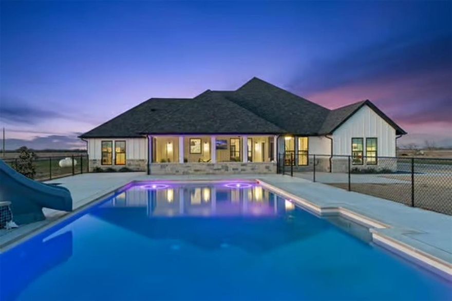 Now offered at $955,000, a rare opportunity to own a private modern farmhouse retreat on 9.66 acres with a resort-style pool and stocked pond.
Luxury, space, and lifestyle come together in one of the most unique properties available in Caddo Mills.
Experience the perfect blend of modern farmhouse design and wide-open Texas living in this custom-built home set on nearly 10 acres. Designed for both everyday comfort and elevated entertaining, this property offers the privacy buyers are looking for with features that are hard to find in traditional neighborhoods.
The heart of the home features an open-concept layout with vaulted ceilings, abundant natural light, and a seamless flow between the living, dining, and kitchen spaces. The kitchen is thoughtfully designed with generous prep space, custom cabinetry, and a large island ideal for gathering and hosting.
Step outside and the lifestyle truly begins. The resort-style pool creates a private backyard oasis perfect for relaxing evenings or entertaining guests, while the stocked pond adds both beauty and function to the property. With 9.66 acres, there is ample room for outdoor living, recreation, or future customization.
The home offers spacious bedrooms, a well-appointed primary suite, and flexible spaces that can accommodate work-from-home needs, guests, or multi-generational living.
This property is ideal for buyers seeking acreage in Caddo Mills, a modern farmhouse with land, or a home with both a pool and pond, all while enjoying the privacy of country living without sacrificing accessibility.
Conveniently located with access to nearby highways, this home offers an easy commute while still providing the peace and space of rural living, with shopping, dining, and everyday essentials just a short drive away.
Now priced at $955,000, this property presents a compelling opportunity for buyers looking to secure acreage, privacy, and luxury features at an exceptional value.