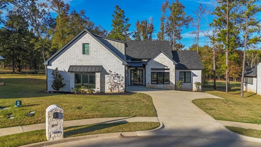 Discover the perfect balance of sophistication, comfort, and resort-style living in this custom-built masterpiece located in the exclusive Cottage at Eagle's Bluff a 55+ gated enclave of Eagle’s Bluff. With 3 bedrooms, 3 bathrooms, and 3,059 square feet of meticulously designed living space, this residence embodies refined craftsmanship and timeless elegance. From the moment you enter, you’re greeted by soaring ceilings, rich hardwood floors, and expansive windows that flood the home with natural light and frame breathtaking views of the manicured golf course green just beyond your back porch. The open-concept living area seamlessly extends outdoors through a grand sliding glass door system, leading to an impressive covered patio complete with a fully equipped outdoor kitchen and gas fire pit—the ultimate space for entertaining or unwinding in style. Every element of this home reflects uncompromising quality. The gourmet kitchen showcases marble countertops, custom cabinetry, and premium finishes. The luxurious primary suite offers an elegant retreat with spa-inspired details, while additional guest suites ensure comfort for family and friends. Situated within the coveted Eagle’s Bluff Golf &Lake Community, residents enjoy access to world-class amenities including a championship golf course, private clubhouse, tennis courts, and much more—all within a secure, beautifully maintained neighborhood. Experience a lifestyle defined by elegance, leisure, and luxury. Call today for your private tour.