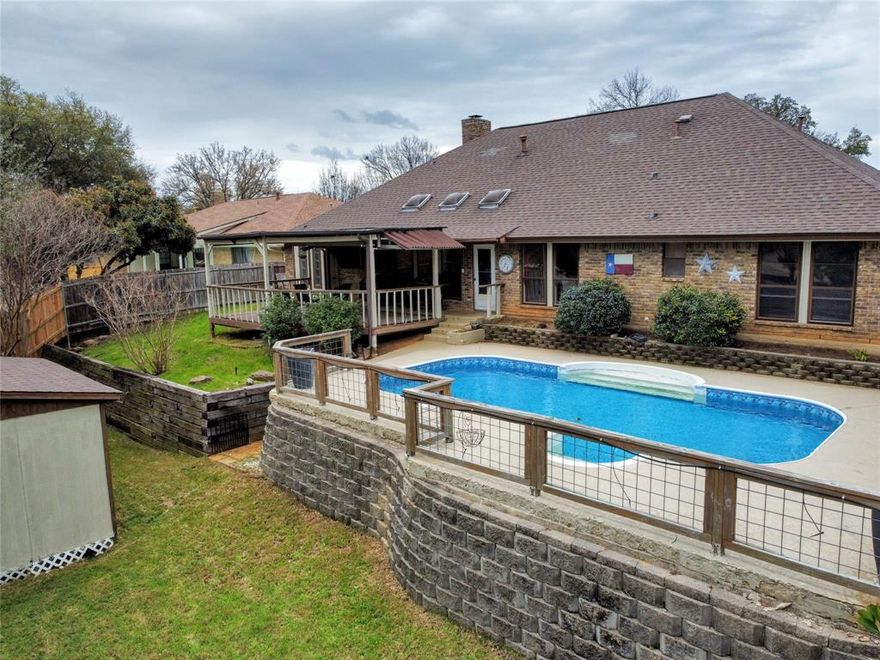 You will LOVE this fantastic single story home in the Huntwick addition of Arlington in the highly desired Martin High school attendance zone AND with an in ground swimming pool-just in time for summer!!! Enjoy updates including wood flooring, leathered granite countertops, stainless gas cooktop-microwave and dishwasher, updated lighting, updated HVAC system-custom painted cabinets-AND MORE!!! Extra large split master living suite boasts a custom walk-in shower and 2 walk-in closets!!! A HUGE mother-in-law suite on the opposite side of the house is great for multigenerational families!!! Enjoy entertaining your guests in your backyard oasis on your large covered deck overlooking your sparkling swimming pool!!! Large shed is great for extra storage or working on projects. Great location just minutes to major shopping areas, restaurants, and Interstate 20!!!