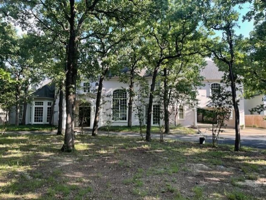 JUST REDUCED $200,000!!!  Huge Home with Custom Finish Out* Amazing over 11,600 + Sq. Ft. * 8 Bedrooms, 9 Baths and 4 Car Garage in the Main House* Two Out Buildings with Total of 4 Bedroom apartments* Over 1.2 Acres* Easy To Show* Sparkling Pool and Spa* Two Kitchens in the Main House and One Big Kitchen in one of the Out Buildings* Parking for at least 20 Cars* Master Down with Huge Bathroom* Large Library with WBFP* 3 Fireplaces* Bring Your Buyers and Offers!!! Call Agent for all showings.