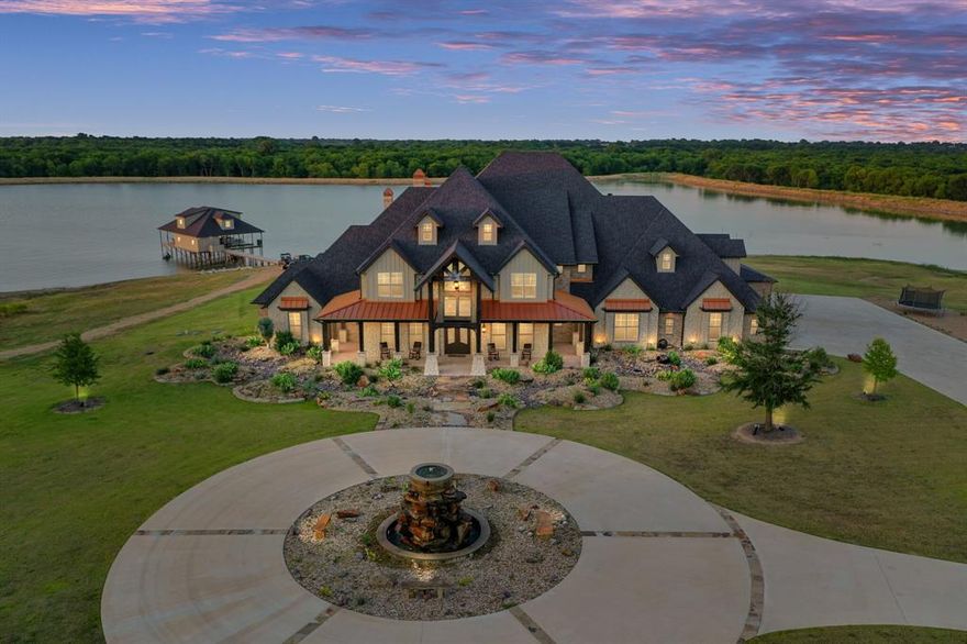 Breathtaking! One of Kind Custom Lake Home on 514 Secluded Acres. Property has a 77acre private rec & fishing lake & is located only 15 mins south of Dallas. This home was meticulously constructed with all the upgrades & views of the lake from every room. Vaulted living room has floor to ceiling windows& is open to chef's dream kitchen. Owner ste is amazing with barrel ceilings, stone fireplace, spectacular ensuite bath, closets, coffee bar,& private laundry room. 1st level also features formal dining, study, guest bed & bath,& the best bar in TX! 2nd level offers 5 bedrooms each with private baths two bonus living areas, laundry & walkout covered patio. Outdoor patio has full kitchen. Boathouse has 5400 ft 1st level with jet ski & boat lifts, sitting area, full kitchen, tackle room, bathrooms & second level 2400 ft party room with kitchen and bathroom. Land offers open pastures & wooded areas. This place is your own private oasis! Owner will finance with 20% down at 5% interest rate.
