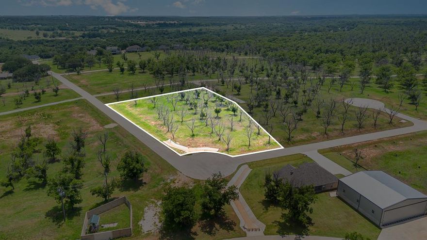 Welcome to an incredible opportunity to create your custom home and private hangar in the prestigious, gated community of Pecan Plantation in Granbury, TX. This expansive, level lot—spanning over an acre—is perfectly situated with direct taxiway access to the community’s paved and lighted runway (FAA Identifier: 66TE), offering the ultimate convenience for aviation enthusiasts. From your backyard hangar, you can taxi straight to takeoff.

Set within a secure, gated, and guarded neighborhood, this property offers both peace of mind and an unmatched lifestyle. Pecan Plantation boasts a wealth of amenities including an 18-hole golf course, clubhouse and restaurant, multiple community pools, campground, private marina and dock with access to Lake Granbury, fishing ponds, RV parking, riding stables, dog parks, and more. Stay active with tennis and pickleball courts, jogging and bike paths, parks, and playgrounds—or take advantage of the community’s convenience with on-site services such as a grocery store, hardware store, pharmacy, clinic, veterinarian, car wash, restaurant, and bank.

With paved roads, electric service, and MUD water and sewer available, this homesite is ready for your vision. Whether you’re planning a peaceful retirement, a family home with room to grow, or the ultimate aviation lifestyle, this is your canvas to bring it all to life.