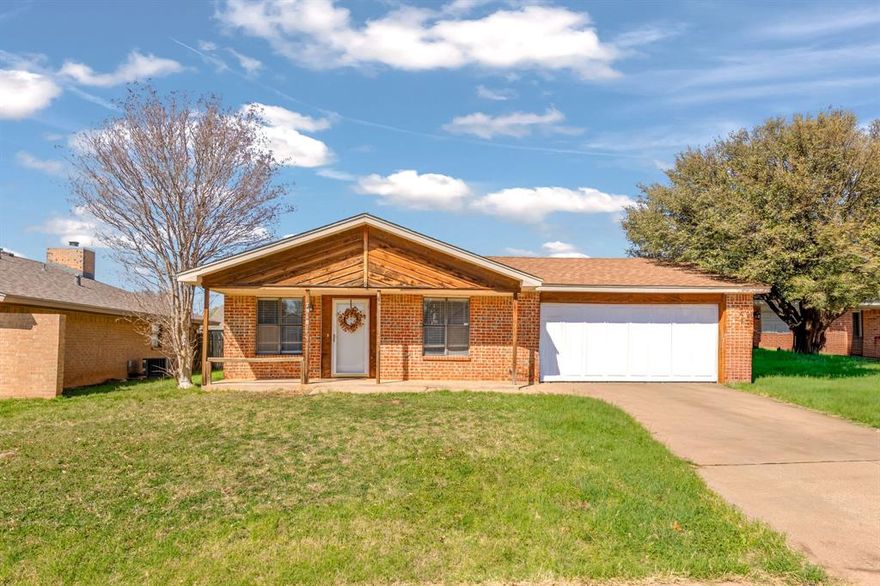 Quality and Character meet budget friendly - 7918 Bonnie Circle is a deal that can't be beat! This charming 3 bed 2 bath, Wylie ISD home, is IT! Prime, central location, open floor plan, affordable size but meets all needs - including a clean and operational garage, ensuite primary bedroom, onsite laundry, oversized brick fire place- buyers hurry fast! This DEAL at this price, won't last long!!