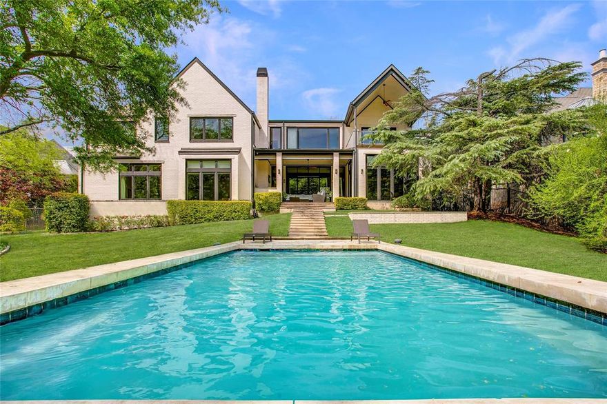 Experience refined modern living in the exclusive gated enclave of Glen Abbey, where this exceptional estate sits on a rare .8-acre cul-de-sac lot backing to a serene creek and lush mature trees.  Built in 2013 by renowned builder Tom Braun and thoughtfully designed in collaberation with architects Robbie Fusch & Billy Ware, this home showcases clean architectural lines and uncompromising quality throughout.
 pier and beam foundation anchors the residence, while 11-foot ceilings and expansive walls of Kolbe Windows & Doors flood the interiors with natural light and frame tranquil backyard views. The open-concept living area features a striking gas fireplace and seamless flow into a chef’s kitchen appointed with sleek SieMatic cabinetry, premium Miele appliances, and dramatic quartzite waterfall countertops.Thoughtfully designed for both elegant entertaining and everyday comfort, the main level includes formal living and formal dining rooms, a media room, private study, guest suite, and elevator access. Upstairs, the luxurious primary retreat offers a sitting area, private balcony, spa-inspired bath, dual custom closets, and an adjoining fitness room. Three additional guest suites, a spacious game room, second study, and secondary laundry complete the upper level. Outdoor living is equally impressive, with a resort-style pool, sports court, expansive yard, and a fully equipped outdoor kitchen and living area with motorized shades—perfect for year-round enjoyment. Additional highlights include a 3-car garage with epoxy flooring, whole-home water filtration, custom Elfa closet systems, integrated Control4 smart home technology, built-in speakers throughout, Hunter Douglas shades, rich tigerwood plank flooring, and minimal carpet limited to the media room. A rare offering that combines sophisticated design, superior craftsmanship, and an unparalleled setting—this home defines modern luxury living.