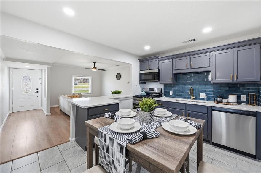 Welcome to this beautiful 2-bedroom, 2-bath home, renovated in 2024 where modern updates meet thoughtful design. Every detail has been carefully upgraded, offering a move-in-ready experience with stylish finishes throughout.  

Step inside to discover a bright and inviting layout featuring updated flooring, fresh paint, and a fully redesigned kitchen complete with modern cabinetry, sleek countertops, and updated appliances—perfect for both everyday living and entertaining.

The spacious primary suite is a true retreat, highlighted by an oversized bathroom that feels like a private spa. Enjoy a large walk-in shower, generous vanity space, and a massive walk-in closet that provides ample storage and organization.

The secondary bedroom and bathroom are equally well-appointed, making this home ideal for guests, roommates, or a home office setup.

Out back, you’ll find a detached workshop with electricity—perfect for hobbies, storage, or a workspace—along with a backyard that offers plenty of room to relax or entertain.

This home combines comfort, functionality, and style in one exceptional package!