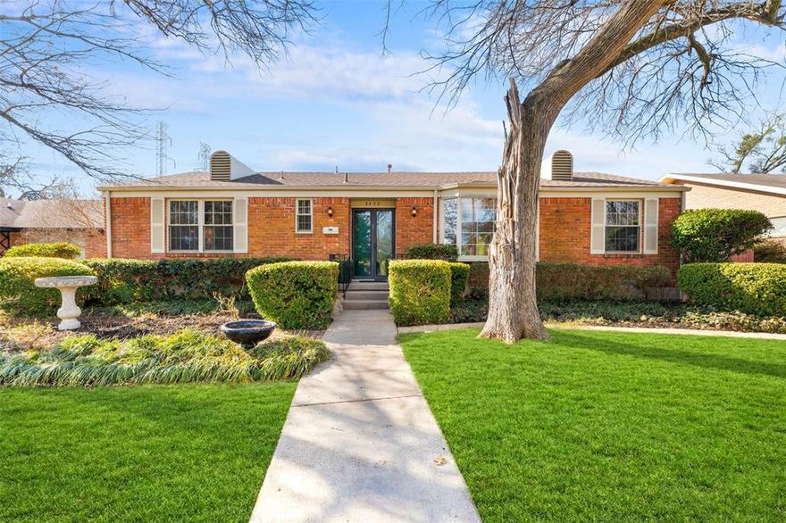 Charming Mid-Century Ranch in Desirable Westwood Park – Oak Cliff. Welcome to this peaceful one-story retreat in the sought-after Westwood Park neighborhood of Oak Cliff. Built in 1958, this charming ranch-style home blends timeless character with tasteful modern updates and inviting living spaces. Step inside to discover a warm and welcoming interior featuring vaulted ceilings, rich designer color palettes, beautiful hardwood floors, and exceptional built-ins throughout. The spacious living area offers a cozy fireplace and charming window seat, creating the perfect space for relaxing or entertaining guests. Designer lighting and thoughtful details add style and personality at every turn. The flexible floor plan includes a formal dining area plus a secondary living space or home office, ideal for today's lifestyle. The private primary suite features a walk-in closet and an open, comfortable layout. A bright and inviting sunroom overlooks the serene backyard, creating a peaceful connection between indoor and outdoor living. The outdoor space is truly special, featuring a covered arbor and deck perfect for entertaining, gardening, or enjoying beautiful Texas sunsets. Gardeners and hobbyists will appreciate the attached garden nursery and storage room, along with a separate storage shed, offering abundant space for tools and projects. The detached garage and all-brick exterior with impressive vintage entry doors add both character and durability. Ideally located just minutes from Oak Cliff Nature Preserve, Kiest Park, and Kiestwood Trail, this home offers easy access to outdoor recreation. Schools, shopping, and dining are nearby, and downtown Dallas is just a short drive away. No HOA. Abundant storage. Thoughtful layout. Classic charm.  This unique property beautifully balances mid-century character with everyday comfort in one of Oak Cliff’s most established neighborhoods.