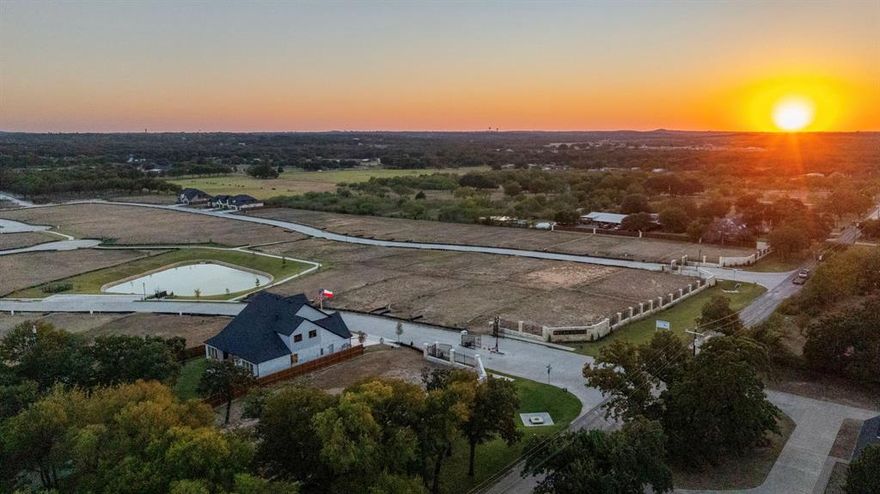 Where privacy meets polished design — welcome to Pecan Grove.
Tucked inside Burleson’s only gated new construction community and backing to a peaceful greenbelt, this single-story home offers the kind of quiet, low-traffic living you simply won’t find in larger neighborhoods.

Inside, 2,245 square feet unfolds with intention — 4 spacious bedrooms, 2 elegant baths, a spa-inspired primary suite with a freestanding soaking tub, gas-start fireplace, custom mud locker, and a covered patio prepped with a natural gas stub for effortless outdoor entertaining.

Designed for those who want space, privacy, and refined finishes — without sacrificing quick access to shopping and I-35.