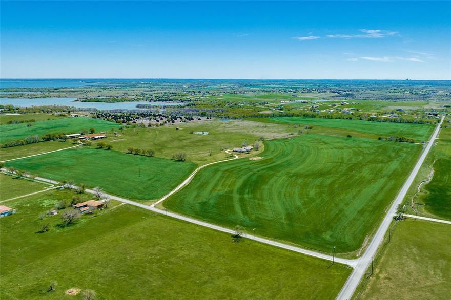 Experience the ultimate in countryside living as you step onto the grounds, you are greeted by the sight of lush pastures stretching as far as the eye can see, offering abundant opportunities. This impressive 122+ acre property providing breathtaking views of the surrounding countryside and nearby Lake Ray Roberts public hunting land and backs up to Corps of Engineers land. The sprawling 3,544 sqft 1 story home situated on a picturesque hilltop of rolling pastures features 6 bedrooms, 3 ½ baths and plenty of room for gathering and entertaining. Complete with a pond and beautiful mature trees, this property presents limitless possibilities. You don’t want to miss out on this once in a lifetime opportunity to own your own piece of paradise.