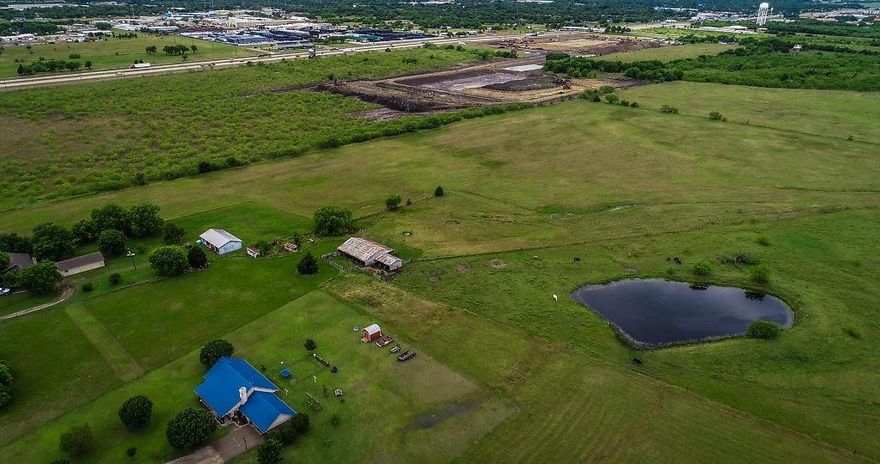 Developers and land investors look no further and bring your vision to Ennis Texas with a great new price.  Location is suited for a planned developed Community within an Opportunity Zone in the City of Ennis.  Residential, multi family, and possible Commercial options for this property.  Utilities are very near the property due to the Buccees store construction.  New apartment complex just down the street.  30 minutes South of Dallas.  

Existing structures hold no valve and listing agent is related to sellers.