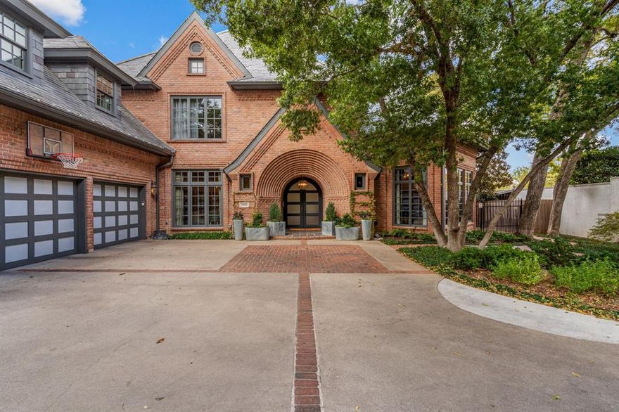 Unparalleled quality, ultimate privacy and every amenity imaginable are discovered in this preeminent Colonial estate located on the bluff side of Simondale Drive, moments from Colonial Country Club. Golf enthusiasts will appreciate the property's prime location - a short golf cart stroll to the 2025 Charles Schwab Challenge golf tournament. This spectacular residence is set on over half an acre showcasing sleek lines and high-end finishes throughout. Walls of windows effortlessly capture incredible sunset views from nearly every room in the home. The epicurean dream kitchen presents premium honed marble, Subzero, Miele espresso, and commercial grade Wolf appliances including gas range, warming drawer, and double ovens. The moody library has sleek marble, temperature controlled wine storage, beverage fridge, Fisher & Paykel dishwasher drawers and ice maker. There are two primary suites; located on the first and second level. Upper level primary has a private balcony offering peaceful views, fireplace and luxurious spa-like bath complete with dual vanities, soaking tub, and custom walk-in closet. All secondary bedrooms have private ensuite baths. The unforgettable outdoor entertaining space boasts a stunning heated pool, putting green, outdoor shower, covered patio complete with built-in BBQ grill, sink, refrigerator, gas heaters and room for dining. Other notable features include buried power lines, tankless water heaters, mosquito system, large green space, wide plank white oak floors, built-in speakers, professional landscaping, and room for elevator, if desired. Thoughtfully redesigned - every details has been meticulously curated to meet the highest standards of quality and modern luxury.