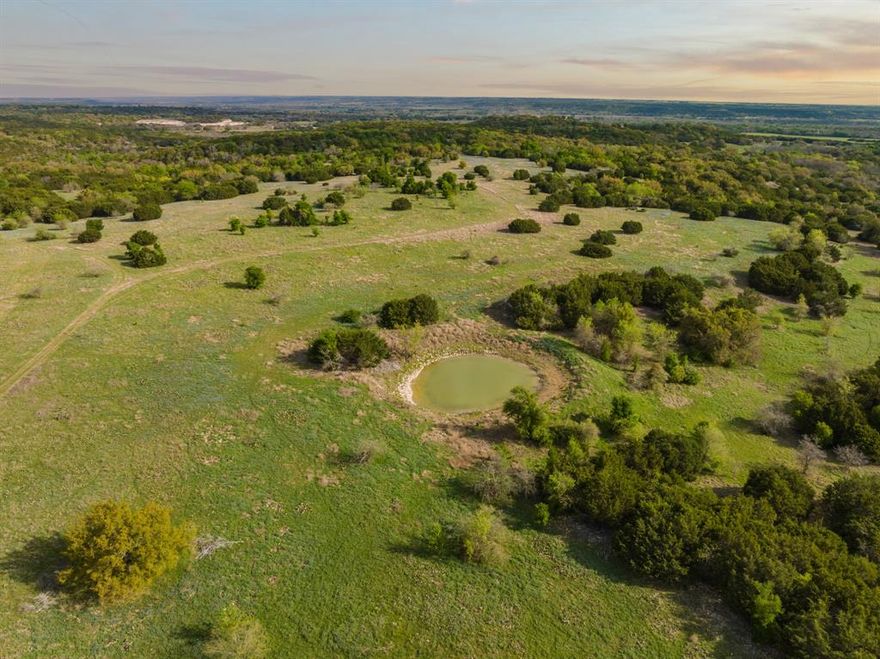 Offering 5 exclusive country properties ranging from 40 Acres to 80 Acres out of a total of 317 acres just outside of Valley Mills, Texas. These beautiful tracts are centrally located 30 minutes from Waco, TX, and 1.5 hours from DFW and Austin.  Each tract is unique all offering the serenity of country life just minutes from modern amenities. The properties offer some of the highest elevations in the area and feature a wide range of topography-clusters of oaks throughout, existing water tanks, offering amazing building sites, abundant wildlife, and scenic views. Seller will soon begin to selectively clean and clear brush and add entrances to certain tracts.  

TRACT 3: 63 ACRES-This tract is a corner lot and has frontage on both county road 3160 and paved road frontage on county road 3155 . Perfect to divide or build your dream home within the beautiful oak trees. Seller removed the original homestead & barn that were on the property.  **Seller to give $25,000 water well credit