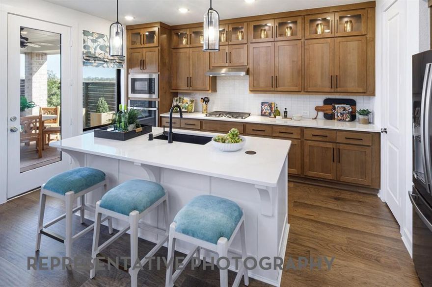 This exquisite home offers over 2,100 sq. ft. of thoughtfully designed space. A striking modern exterior welcomes you with subtle brick, black roof, covered front entry, and a stained cedar garage door. Inside, the open dining and family rooms boast 16-foot vaulted ceilings. a gas fireplace and covered patio which accommodates private relaxation or large gatherings. The heart of the home impresses with a chef-inspired kitchen. Retreat to the secluded primary suite, offering a spa-like bath with an oversized shower, dual sinks, and a walk-in closet.