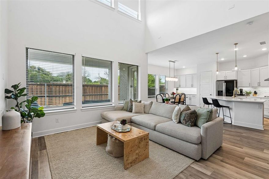 Nestled in the Reserve just steps from the Northaven Trail, this thoughtfully designed 4-bedroom, 3.5-bath home blends modern comfort with effortless livability. Inside, abundant windows cast bright natural light into the open concept living, kitchen and dining areas, creating the perfect setting for entertaining or everyday gatherings. The downstairs bedroom suite, complete with a separate full bathroom, is situated just down the hall from a formal living area complete with a cozy electric fireplace, creating a flexible space for game night, a home office, or everyday enjoyment. Upstairs, the spacious primary bedroom features a high, pitched ceiling and palatial ensuite bathroom, including a soaking tub, walk-in shower, and luxurious custom closet system. The second-story bedrooms are thoughtfully arranged on the other side of a spacious landing, offering ideal privacy and space for a playroom or upstairs den. Step outside to enjoy two porches on the side and back of the home, complemented by a low-maintenance turf lawn for easy upkeep. The neighboring Northaven Trail provides quick access to the city's award-winning system of 150+ miles of hike and bike trails. With shopping and dining just a few blocks away and a quick 15-20 minute commute to downtown Dallas, this home offers the perfect balance of privacy, accessibility, and modern style.