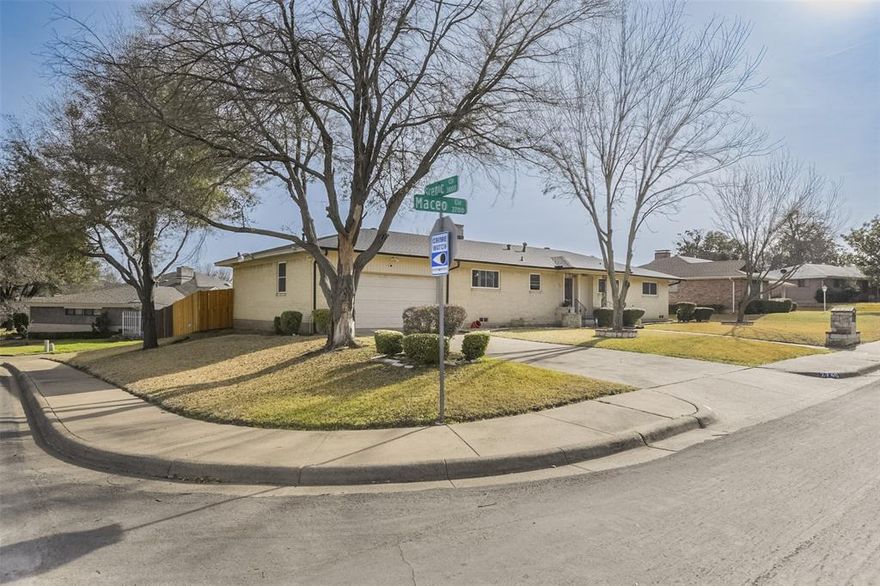 $15,000 PRICE REDUCTION! $5,000 SELLER CONCESSION! Set on a large corner lot in Cedar View Estates, this updated 3-bedroom, 2-bath home offers a bright, open layout and modern improvements throughout. The recently remodeled kitchen features stainless steel appliances, granite countertops, custom cabinetry, and a 2025 dishwasher. The open-concept design connects the kitchen, dining, and living areas, highlighted by a large brick gas fireplace and generous natural light from windows overlooking the covered patio and backyard. The primary suite includes an en-suite bathroom with a walk-in shower. The updated second bathroom offers dual sinks, a bathtub with shower, and a linen closet. All bedrooms are spacious with ample closet space and ceiling fans. The utility room provides additional storage and convenience. Exterior features include a large corner lot, healthy front and back yards, shade trees, and a privacy fence. Parking is abundant with a front driveway leading to the two-car garage, plus additional covered parking accessible from the rear alley. The garage includes a separate storage room ideal for seasonal décor or hobby items. Major system updates include foundation repair in 2024 with transferable warranty, HVAC (2020), roof (2021), water heater (2020), electrical panel (2025), bathroom remodel (2025), and kitchen remodel (2025). Easy access to downtown Dallas adds to the home’s appeal.