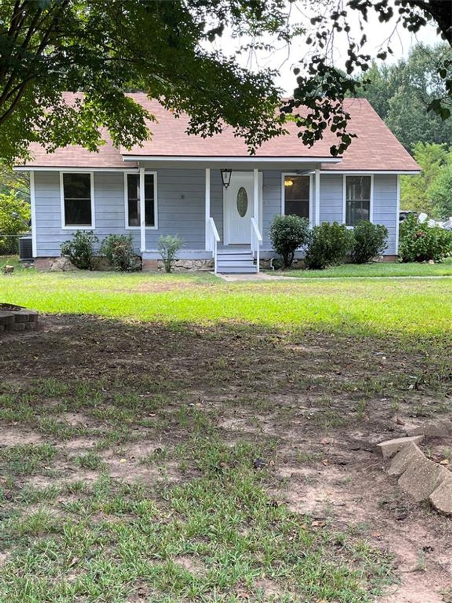 Beautiful Cottage, 1259 square feet, 2 bedrooms, one bathroom on a one acre lot one mile from Cypress Lake. Property is located in the Bossier ISD. Recently painted outside and inside. 13 miles from Bossier City and 5.5 miles from Benton in a peaceful country setting. Recently resurfaced highway from Airline Hwy to 1401 Linton Rd. Cypress Black Bayou Recreation Park is 1.5 miles from the property. Property has a private water well. There would have to be maintenance done to have system brought online. Seller is not responsible for repairs. There is a public water system serving the house.
