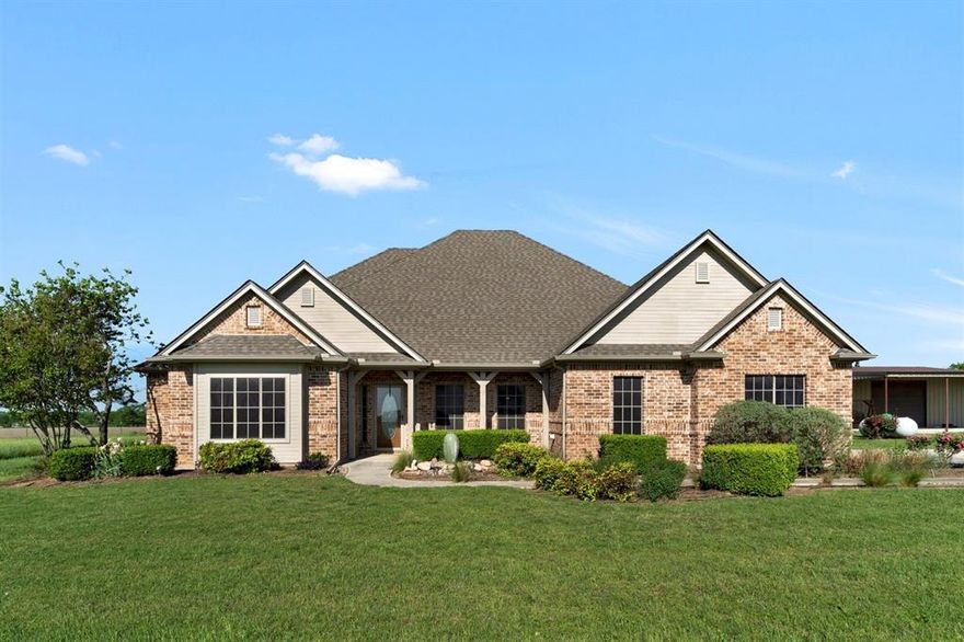 Welcome to your serene oasis in Justin, TX! Nestled on an expansive 62 acres, this stunning 2,596 sq ft home offers the perfect blend of comfort, privacy, and convenience. Featuring 3 spacious bedrooms and 2.5 baths, this residence is designed for both relaxation and functionality. Step inside to discover an inviting open floor plan that seamlessly connects the living area. The well-equipped kitchen features generous cabinet storage space, while the enclosed sunroom provides a bright and airy space to unwind while enjoying the picturesque views of your land. An additional office space offers the ideal setup for remote work or study, ensuring you have a dedicated area for productivity. The outdoor space is equally impressive, featuring a charming back porch that invites you to savor the tranquil surroundings. In addition to the main residence, the property offers barns and a 30x35 insulated shop with an overhead door, perfect for hobbies or additional storage. Despite its peaceful rural setting, this home is conveniently located near major highways, offering easy access to nearby amenities while maintaining a private feel. Don’t miss this rare opportunity to own a slice of paradise in Justin, TX. Experience the perfect blend of country living with modern conveniences! Buyer and agent to verify all room dimensions and school zoning.