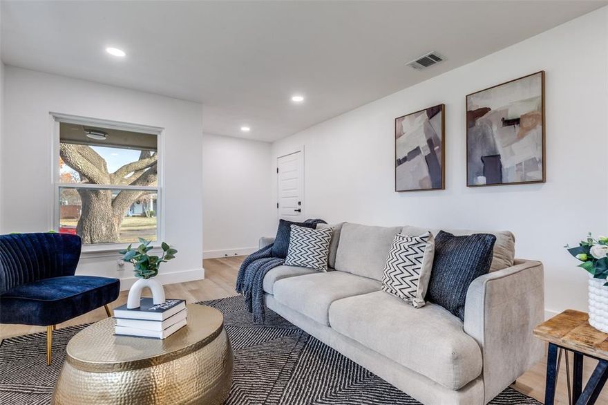 This stunningly remodeled home is the one you’ve been waiting for! With a brand new roof and completed foundation work, the major updates are already checked off your list. Inside, you’ll find a bright open layout with luxury vinyl plank flooring, fresh paint, and modern finishes throughout. The kitchen is a standout with crisp white cabinets, gold hardware, quartz countertops, and new stainless steel appliances—ready for everyday meals or entertaining guests.  The spacious primary suite offers the perfect retreat with an updated en-suite bath featuring double vanities and a sleek tile shower. The large, fenced backyard is perfect for relaxing or entertaining under the shade of mature trees, and there’s plenty of room to add your own touch.  Whether you're a first-time buyer or just looking for move-in ready with peace of mind, this one has it all.