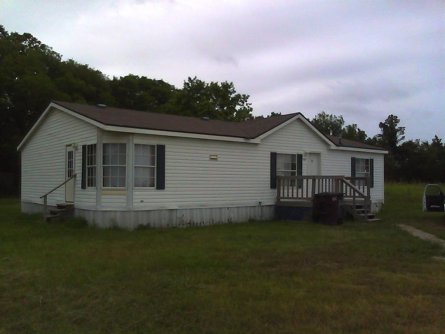 3 bedrooms and 2 baths double wide home sits in a quite neighborhood, fence backyard with new deck porch, large living room with fireplace. huge fenced backyard. Lease Purchase and Rent to Own program available with 0 down payment, $900 monthly payment at 30 years term, $1500 attorney fee for closing documents, $2400 upfront to move in.