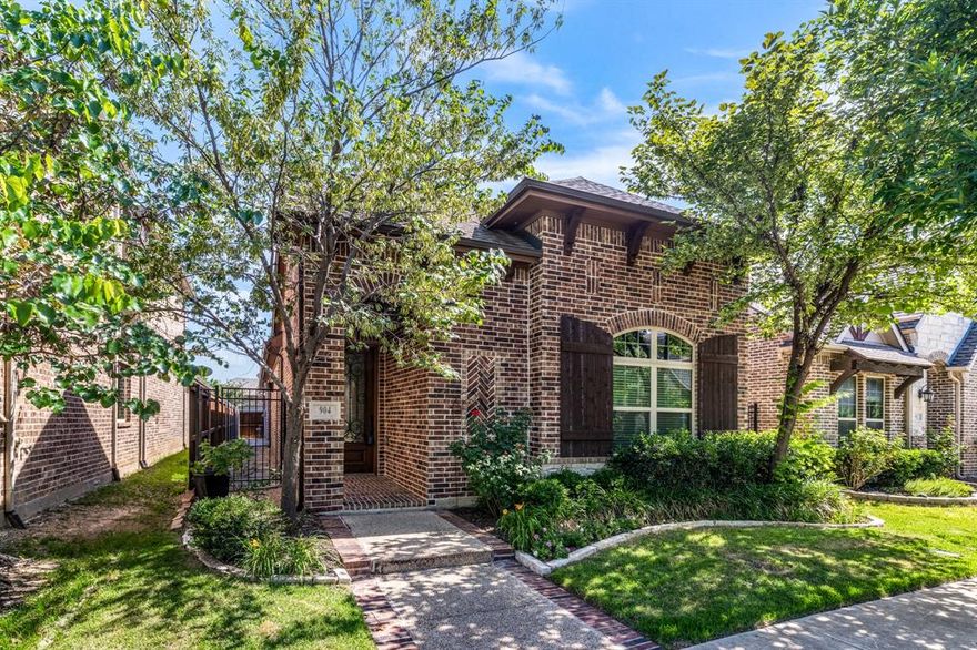Welcome to this beautifully maintained one-story home in the heart of Viridian, where charming curb appeal and thoughtful design create an inviting first impression. Mature landscaping and blooming trees frame the brick exterior, while an arched entry leads into a bright, open interior filled with natural light.
Inside, rich hardwood floors flow through the main living areas, where a spacious living room with a fireplace opens seamlessly to the kitchen and dining space. The kitchen features granite countertops, white cabinetry, stainless steel appliances, a gas cooktop, and a large island with seating—perfect for everyday living and entertaining.
The private primary suite offers a relaxing retreat with generous space and a spa-inspired bath featuring dual sinks, a soaking tub, separate shower, and walk-in closet.
Additional bedrooms are well-sized and versatile for family, guests, or for a designated work from home space, as used in this setup. Thoughtful details throughout the home include crown molding, abundant storage, and a functional laundry room with built-in shelving located off the mudroom and the primary suite.
Enjoy outdoor living with a private backyard and covered patio—perfect for relaxing evenings or weekend gatherings.
Located in the highly sought-after Viridian community, residents enjoy resort-style amenities including the Lake Club, Sailing Center, pools, tennis and volleyball courts, miles of trails, parks, and a neighborhood elementary school—all just minutes from shopping, dining, and major highways.