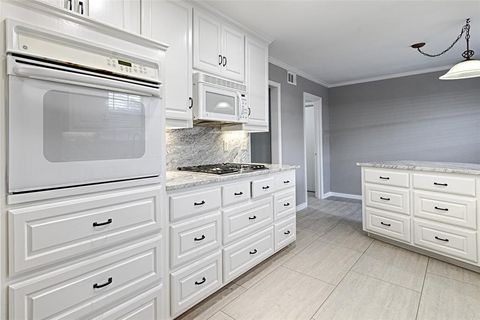 Photo of 614 Brookfield Drive, Garland, TX 75040 (MLS # 21269037)
