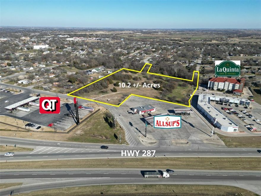 10.2 acres of undeveloped commercial land in a prime location in Decatur, TX. This tract is highly visible from Hwy 287 and is situated between a newly built QT gas station and Allsup’s. Nearby, you’ll find a La Quinta Hotel and a multi-family property. According to Decatur’s zoning map, the western portion of the parcel is zoned C-2, while the eastern portion is zoned MF.  Access is available via S. Trenchard Rd to the west and State St. to the east.
