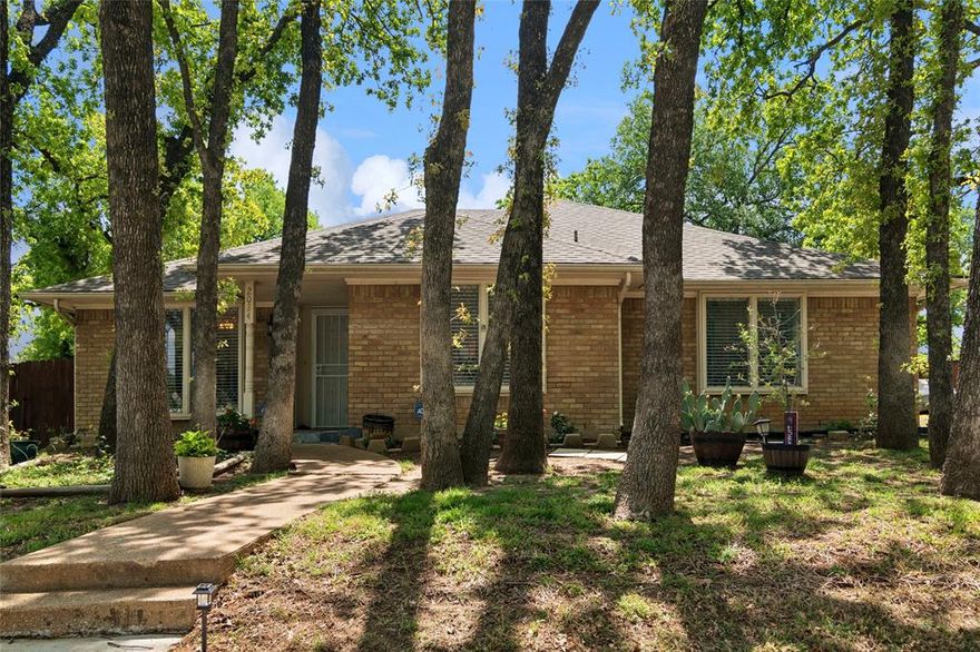 Location location location …

Rare North Arlington home surrounded by mature trees. Prime location in popular Entertainment District. Minutes to DFW Airport, Cowboy Stadium, the Globe Life Field, Texas Live and numerous Restaurants and Bars, major highways I-30, 360 and 161. Less than 30 minutes to downtown Dallas and Ft Worth.  

UPDATED 4 bedroom with 3 full baths, 2-car garage and a long driveway, on large corner lot. The large family room is the house's focal point, featuring high ceilings and French doors that lead to a large patio for BBQs and family gatherings. Large Primary Bedroom has two private vanities, closets and a walk-in shower. The 4th bedroom would be excellent as a Mother-in-law or private guest suite off the Kitchen and away from the other bedrooms with its own full bath. Updated granite throughout Kitchen and baths; Tile flooring and Luxury plank in bedrooms.All information in this listing is deemed reliable but not guaranteed. Buyer and buyers agent must verify all information, measurements, taxes etc.