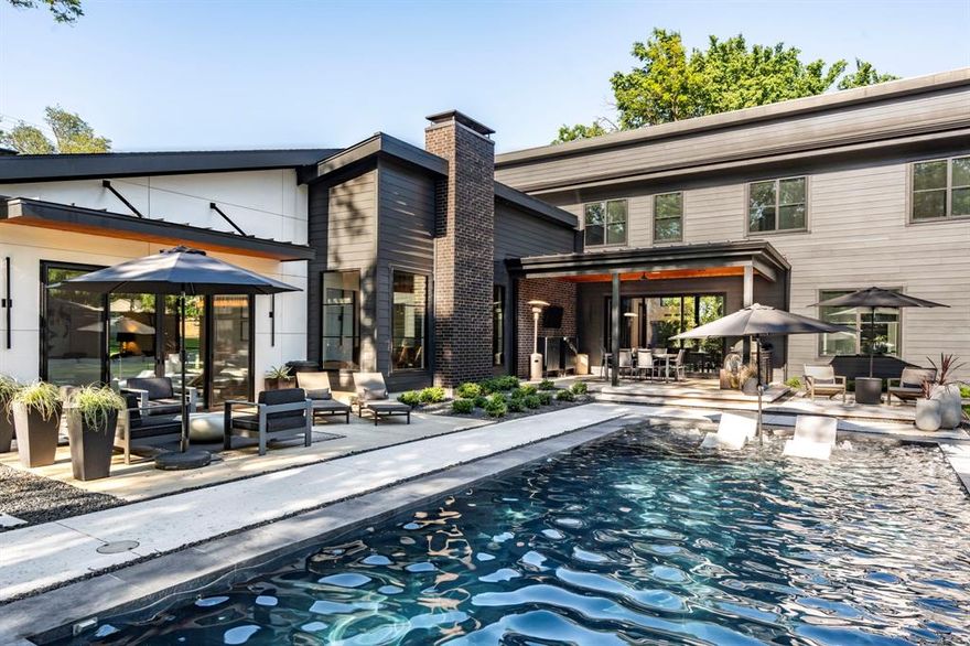 Experience unparalleled luxury in this custom modern masterpiece built by 5 West Homes and completed in 2022 with the owners' personal design touches and upgrades. Situated on over a third of an acre, this exquisite home spans 4,381 square feet, offering a harmonious blend of style and comfort. Revel in the beauty of white oak floors and floor-to-ceiling windows that invite an abundance of natural light throughout. This immaculate abode features 4 spacious bedrooms, all with en suite spa like baths. With multiple living areas, including an upstairs family room and two offices, the home is perfectly designed for both relaxing and productivity. The chef's kitchen is a highlight, equipped with top-tier appliances, a double oven, gas range, and a 42-inch refrigerator, all complemented by black honed granite countertops and bespoke cabinetry. Step outside to your ultra private retreat, where a heated saltwater pool awaits, alongside a built-in grill ideal for alfresco dining, while custom landscaping and lighting enhance the home's appeal. Back inside you'll find an abundance of storage space, an AV room, and a sophisticated smart home system, fully wired for data, sound, and security. The three car garage is perfect for your vehicles and a golf cart to zip around the neighborhood. Zoned to highly-rated Richardson ISD schools and just minutes from White Rock Lake and the best East Dallas eateries and shopping, this Lake Highlands stunner is a true sanctuary of modern living, thoughtfully designed for the discerning homeowner.