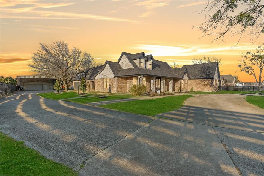 Completely reimagined and expanded, this stunning North Rockwall estate at 990 Cornelius Rd, Rockwall, TX 75087 delivers luxury living, unmatched versatility, and prime location on 2.5 pristine acres. Recently renovated with approximately 1,500 additional square feet added, the home now offers an impressive 5,088 sq ft featuring 6 bedrooms, 5.5 baths, multiple living areas, and flexible spaces designed to adapt to your lifestyle.

The extensive renovation includes the addition of a full bath and three new rooms—two currently utilized as bedrooms, with a third easily functioning as a seventh bedroom, office, media room, or fitness space. The fully operational private apartment is ideal for multigenerational living, guests, or income potential, complete with its own full kitchen, living and dining areas, bedroom, bath, and private balcony.

The primary suite is a true retreat, showcasing a luxury-inspired spa bath and an adjoining flex space perfect for a private office, gym, sitting room, or secluded lounge. At the heart of the home, the open-concept kitchen is designed for entertaining and gourmet cooking, flowing seamlessly into spacious living areas that make hosting effortless.

Outside, the property continues to impress with a 75x30 red steel, fully insulated workshop equipped with multiple 220-volt outlets, plus an additional 40x30 covered area—ideal for equipment, hobbies, or business use. A horse barn with stalls enhances the estate’s versatility and rural charm while maintaining close proximity to city conveniences.

Located in highly desirable North Rockwall, just minutes from Downtown Rockwall, The Harbor, and all the shopping, dining, and entertainment along the I-30 corridor. Enjoy quick access to the new HEB and the rapid growth and development at FM 549 and John King, further strengthening long-term value.

Luxury, land, location, and limitless potential—this is Rockwall living at its finest.