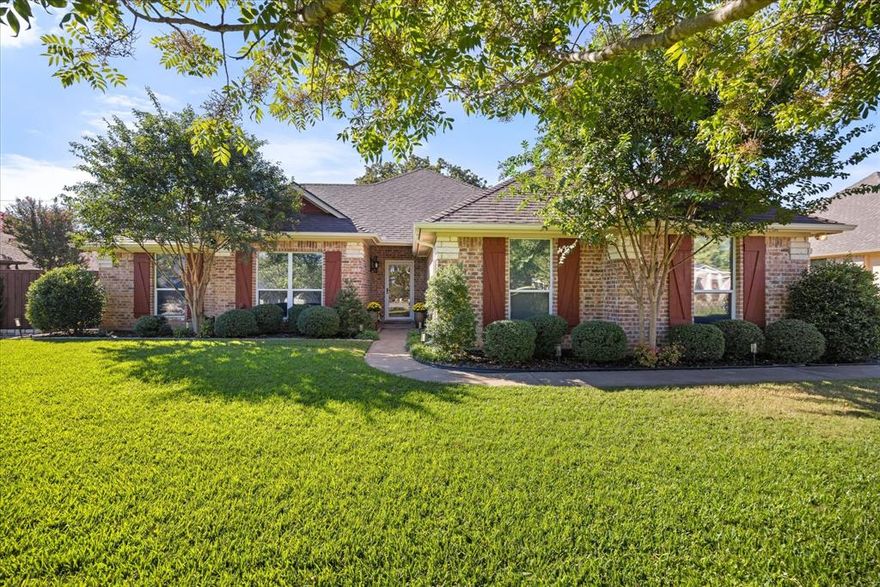 Immaculate 1,822-sq-ft residence perfectly situated within the prestigious Pecan Plantation Golf Community. This move-in-ready home seamlessly blends modern upgrades with timeless elegance, offering an open-concept layout designed for both relaxation and entertaining.
The interior showcases engineered hickory wood flooring, granite countertops, and stainless steel appliances that elevate the kitchen’s sophistication. Enjoy the luxury of an enclosed patio, hot tub and an extended pergola-covered terrace overlooking a beautifully landscaped backyard.
Recent updates include a new HVAC system (2018), new roof and window screens (2025), fresh paint and carpet (2021), and a new hot water heater, ensuring peace of mind and lasting comfort. The exterior is complemented by custom rock retaining walls, fencing, and a full sprinkler system.
Nestled near the community gate, parks, PAC center, and golf course, this home offers unmatched convenience within one of Granbury’s most exclusive gated neighborhoods.