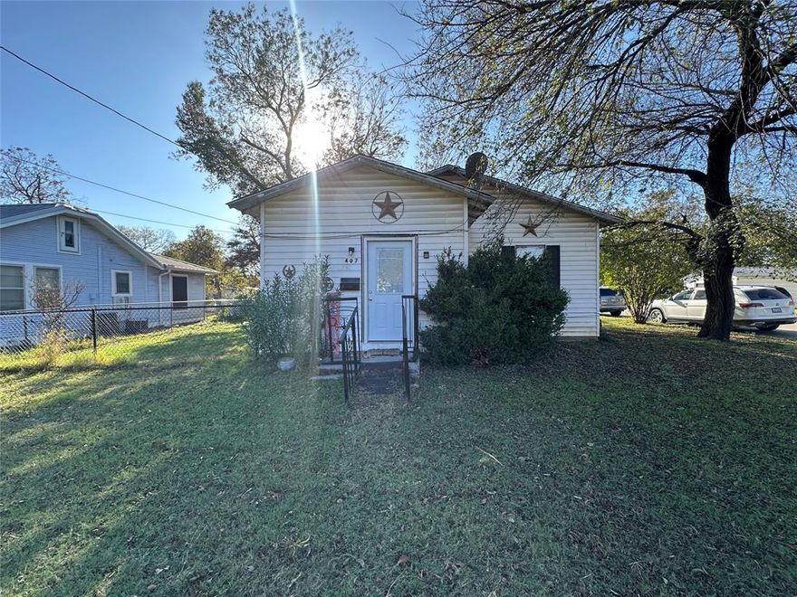 Uncover the potential this home has to offer. Sitting on a corner lot with a spacious yard and cozy living space. This property offers a blank canvas for your creative vision. Perfect for investors looking for their next project. Home is being sold as is.