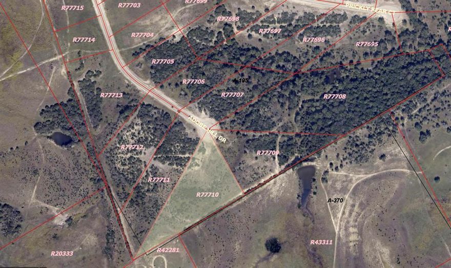 6.49 Acres! This lot is available with two neighboring lots while they last - 69 and 70 - with a total acreage of 25.98
acres. Build your custom home in the serene Sunrise Mountain Ranch Community. This
hidden oasis offers a grand gated entrance and perimeter fencing for privacy. Enjoy country living just a 10-minute
drive from the city. With stunning Creekside views and the picturesque rolling hill country surrounding you, this land is
a must-see. New roads have been recently added throughout the community. Barndominiums, tiny homes, and other
alternative structures are welcome.