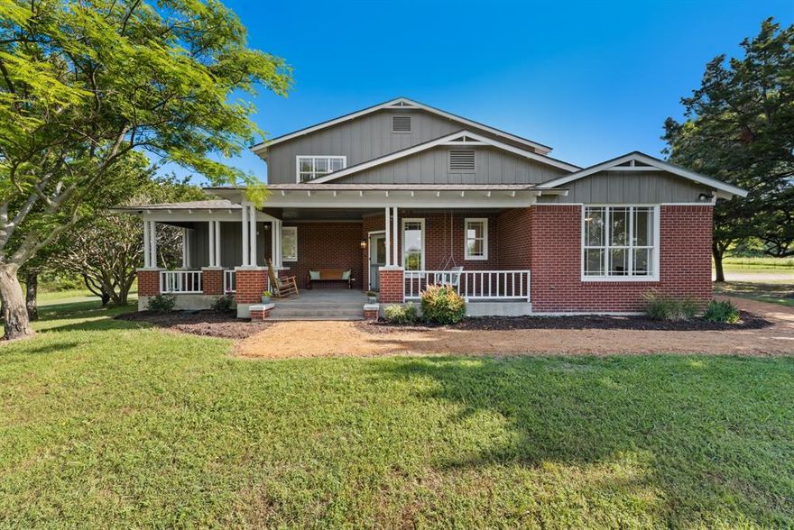 This is a unique opportunity! Home sits on one of 7 lots at the end of a private drive, so keep all 20+ acres for your own private sanctuary, OR sell the lots in the future as you desire. 3 of the lots back up to county road 4675. With concrete piers to the bedrock, this home has a sturdy foundation! Welcome to 3829 FM 896! This home really has been updated from top to bottom! Brand new roof, Kitchen, utility room, and 3 full baths have all been remodeled in April 2025. New paint throughout entire home, as well as new siding on the exterior. Relax and watch the deer on your wrap around front porch with a swing! This modern farmhouse wows with cathedral ceilings and so much natural light. A classic look- Quartz countertops, new stainless steel appliances (and wine fridge!!), and all new fixtures in the kitchen! The large dining room, primary bedroom with ensuite on the first floor, second bedroom with full bath, large utility room, and media room to enjoy rounds out the first floor. The second floor consists of two bedrooms with beautiful views and light, a third full bath, and a secret hideaway for storage or a fun place for a kids reading or play nook behind a bookshelf door. The home itself is gorgeous, but the land and views are exceptional, with fire pit, garden with drip irrigation, and plenty of room to roam. Call now to set up a tour!