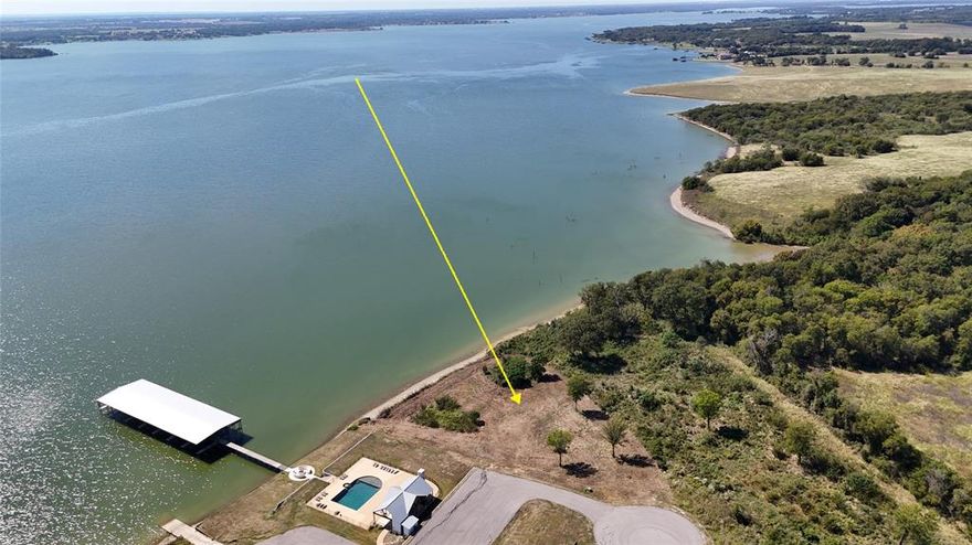 Dreaming about life on the water, this 1.18-acre cleared lot in the gated Chambers Bay subdivision might be exactly what you’re looking for. With roughly 215 feet of shoreline, you’ll have plenty of space to enjoy the lakefront lifestyle. The lot is cleared and ready for your build, so you can start planning your dream home from day one. Chambers Bay is one of the premier communities on Richland Chambers Lake, offering a long list of amenities that make everyday life feel like a getaway. Just steps from this property, you’ll find the community clubhouse, sparkling pool, boat ramp, and marina all designed to make lake living easy and fun. Even includes courtesy mailboxes & a gated entrance, giving you peace of mind and convenience. Of course, the real star here is Richland Chambers Lake itself. Known as one of the best fishing lakes in Texas, it’s a favorite for anglers of all levels. Beyond fishing, it’s also the perfect place for boating, water skiing, kayaking, swimming, or simply floating the afternoon away. Whether you’re chasing trophy catches or spending a lazy summer day with family, the lake has something for everyone who loves the outdoors. When you’re ready to get off the water, you’re only a short drive from Corsicana, a historic town full of character and charm. From boutique shopping and fine dining to local treasures like Collin Street Bakery, world-famous as the “fruitcake capital” Corsicana has plenty to enjoy. It’s the kind of town where you can grab dinner, explore historic streets, & still be back home in time for a sunset by the water. Families will also appreciate that the property is located in Kerens ISD, from elementary through high school. It’s a great choice whether you’re looking for a full-time home, a weekend retreat, or a future retirement spot. This lot truly combines space, shoreline, and lifestyle. With resort-style amenities, small-town convenience nearby, and endless lake activities right outside your door.