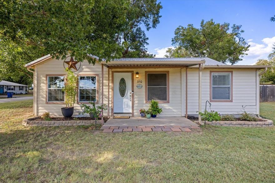 Price REDUCTION:  CHARMING Farmhouse in Tolar ISD!!!  Set on a spacious corner lot with large mature pecan trees, this home sits in the desirable community of Tolar, known for its highly rated schools (Tolar ISD).  Amazing close-in location, just a short walk to main street shops and restaurants.  You’ll love the open, light, and bright layout with brand new luxury vinyl plank flooring throughout, new paint & baseboards. The floor plan includes 2 bedrooms, 2 full baths, and a large kitchen with ample counter space, plus an adjacent dining area perfect for family meals.  The home features metal roofs (for durability and low maintenance) on all 3 buildings.  Enjoy extra space & storage (house, garden-laundry shed (14'X10') and workshop-storage building-with electrical (18'X23'). Recent updates include new rain gutters, a new block & base foundation with transferrable warranty, and a Trane HVAC system installed in 2020. Outdoors, the fenced backyard with a large patio creates an inviting space for entertaining or relaxing under the mature pecan trees. It's a great back yard ready for your cookouts and s'mores.  Be FOOTBALL ready!  A workshop with electrical, lighting, and shelving provides space for projects or storage, while an additional shed offers a laundry room with space for gardening or workouts. The oversized lot allows parking for an RV, boat, or extra vehicles, all enclosed by a wood privacy fence and additional large grass area that can be enclosed. This home blends small-town charm, modern updates, and a prime corner lot with walkability—a wonderful find in Tolar!  A short drive away you will find Granbury-Voted the Best Small Historic Town in the USA for the 3rd year running and recent the Celebration Capital of Texas.  In addition to small town living you have access to the DFW metroplex and DFW International Airport.  Country & City living at it's best.  COME SEE TODAY!  Ask your Realtor for additional information on updates and warranties posted.