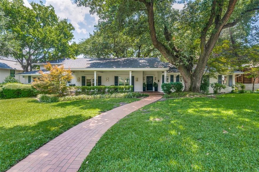 Incredibly updated w-over 3700sqft of well-thought-out living space, open concept design & high-end finish out. Complete w-oversized covered front porch, complete w-5 bdrms, 2 LA's, a chef's kitchen w-huge island prep & cooking, Sub-Zero refrigerator, double ovens & breakfast bar.  This home offers great separation of space w-original center hall design on the western end has 3 bdrms, 2 full baths w-one being an ensuite w-huge WIC that could be a 2nd master. Eastern wing addition includes 5th bdrm-office, primary suite w-ensuite bath, separate shower & tube, WIC, vaulted ceiling & balcony overlooking turfed backyard & outside living.  All of the LA's in the home are cascaded w-light from the abundant windows & doors from both northern & southern exposures. Additional amenities incl; huge utility room w-workout space, hdwd floors throughout, 2 WBFP, WD privacy fence, 2 CG plus 3rd car parking pad. All within blocks of White Rock Lake & park, & award-winning Lakewood Elementary!