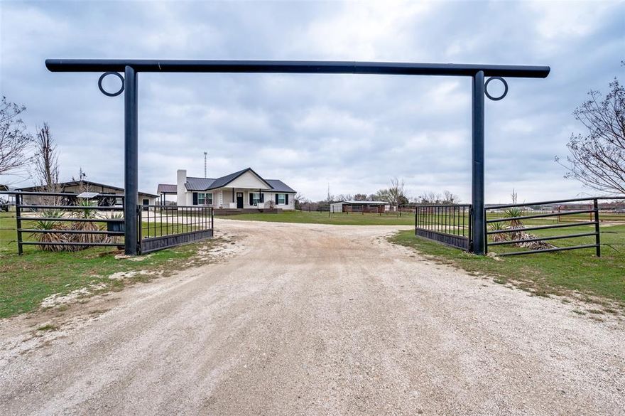 Meticulously maintained, move in ready horse property in Southern Cooke County. Originally constructed in 1948, the 3 bed 2 bath home is the perfect blend of comfort and craftsmanship with a little bit of country charm. Inside you'll find rich hardwood floors, granite countertops, an abundance of closet space and tons of custom touches top to bottom. The completely updated primary bath creates a relaxing private space and plantation shutters throughout the home provide both style and function. Additional highlights include a whole home generator, updated appliances and new HVAC system. Fully pipe fenced and cross fenced into three pastures this property was carefully laid out with equine safety in mind. Just steps from the house, the horse barn features two 15 ft x 10 ft stalls, separate feed room, tack room, hay room and tool room with a 14 ft wide concrete aisle. Covered 17 ft x 35 ft trailer & implement storage, loafing sheds in each pasture, round pen, a large roping and riding arena with pens make this property truly plug-and-play. Do not miss out on this rare offering as properties this nice are few and far between.