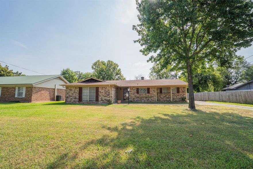 Come check out this brick 3 bedroom, 2 bathroom home in Sulphur Springs on a quiet street! Enjoy views of the back patio and yard from the living room that also includes a brick fireplace. An extra 16x17-foot family room can be used as a fourth bedroom, a space for entertaining, game room, gym, flex space, or more. You’ll find wood laminate flooring in the living, dining, and family room. The kitchen offers stainless steel appliances with a smooth-top range, dishwasher, double bowl sink, and breakfast bar. The utility room is off the kitchen. At the end of a hall, the primary suite has an ensuite bathroom and walk-in closet. Outside you have a spacious patio for relaxing plus privacy wood-fencing in the backyard. A 1-car carport gives you a place to keep your cars out of the weather. Take a look at this home in a neighborhood tucked away from drive-through traffic!