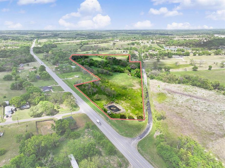 Scenic Acreage with Pond & Beautiful Tree Coverage Outside Sherman City Limits! Experience the natural beauty of this 22-acre tract located off Watkins Road near Hwy 11. Currently under AG exemption with abundant tree coverage provides shade, privacy, and a picturesque setting throughout. With road frontage and convenient access, you’ll enjoy a quiet country atmosphere just 10 minutes from US 75 and Sherman. This is a rare opportunity to own land in a rapidly growing area. Survey with flood plain information is available.