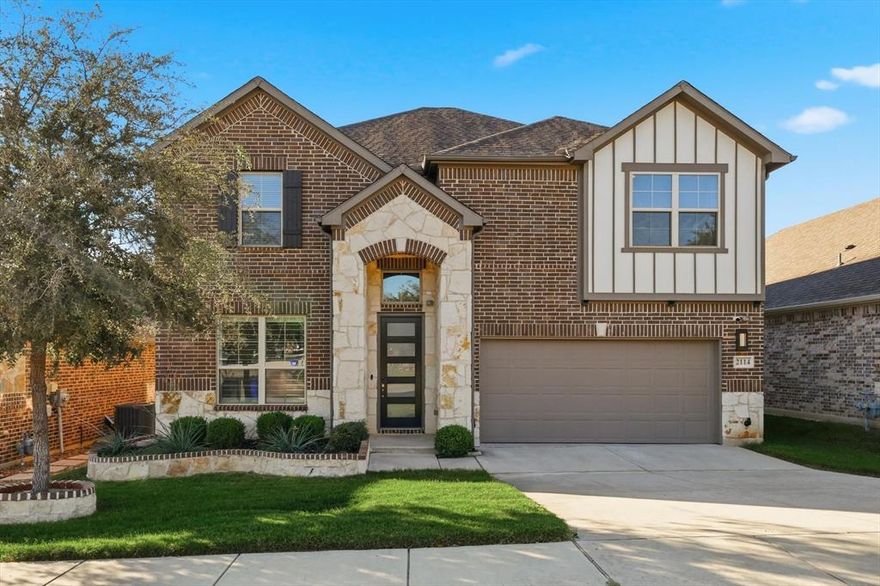 Welcome to 2114 Stanhill Dr — a beautifully appointed Meritage Home combining energy efficiency, smart design, and elevated style. This 4-bedroom, 3-bath home offers 2,743 sq ft of open living space filled with natural light and warm modern touches.

The heart of the home is the chef’s kitchen, featuring an oversized quartz island, KitchenAid stainless appliances, (refrigerator stays) 5-burner gas cooktop, subway tile backsplash, walk-in pantry, and ample cabinetry. It flows seamlessly into the spacious living room with vaulted ceilings, wood-look tile floors, and large windows, complete with wooden shutters, overlooking the backyard.

The primary suite on the main floor feels like a retreat with bay windows, a soaking tub, separate shower, dual vanities, and a walk-in closet. Upstairs, a large game room anchors three generously sized secondary bedrooms, each with roomy closets and access to a full bath.  Large Storage room is a true bonus!

Enjoy outdoor living on the covered patio — perfect for grilling, (grill stays) relaxing, or watching kids and pets play in the private, landscaped yard. The EV-ready garage, tankless water heater, and Meritage’s energy-efficient construction add everyday convenience and long-term savings.

Nestled in sought-after Terrace Oaks, this home offers nearby walking trails, a playground, and easy access to I-35, Lake Lewisville, shopping, and dining.

Move-in ready, impeccably maintained, and full of charm — come see why 2114 Stanhill Dr is the perfect place to call home!