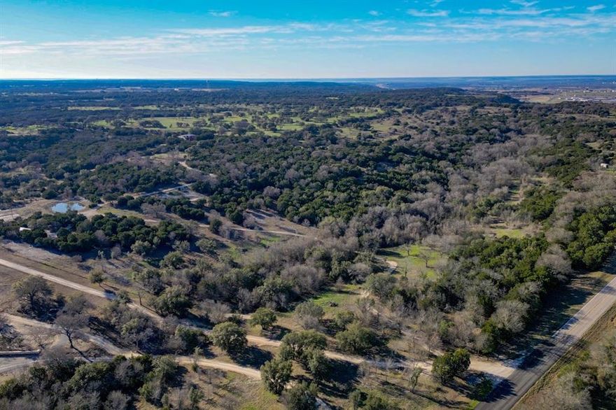 Discover 22.76 acres of Hill Country beauty in western Coryell County, ready for your vision—whether that’s building, recreation, or simply escaping to nature. Conveniently located off FM 215, just 1.5 miles from Highway 36 and only 10 minutes from shopping and dining in Gatesville, this property offers both seclusion and accessibility. A Coryell City Water meter has already been paid for (installation pending), giving you a head start on development. Portions of the land have been thoughtfully cleared of cedar, revealing scenic open areas dotted with majestic hardwoods and multiple potential building sites. The remaining acreage features a natural mix of hardwoods and cedar, with a creek meandering through the property.
Wildlife is abundant—whitetail deer, turkey, dove, and even the occasional hog frequent the land—making it an ideal spot for bow hunting or enjoying the outdoors. This small acreage ranch offers endless opportunities to create your own retreat in the heart of the Hill Country.