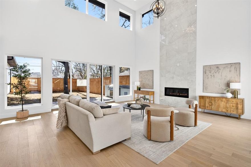 Experience this stunning home with a full 3D virtual tour, contact your agent for instant access!
Discover modern comfort in this brand-new 4,300 sq. ft. home in Midway Hollow. This thoughtfully designed five-bedroom, five-bath luxury residence offers open living spaces, quality finishes, and functional design ideal for everyday living and entertaining.
The grand great room features a 21-foot ceiling, abundant natural light, and a gas fireplace. The adjacent kitchen includes an oversized Taj Mahal Plus quartz island, white shaker cabinetry, a 48-inch Wolf gas range, full-size Sub-Zero refrigeration, and wide-plank white oak flooring throughout.
Two bedrooms with en-suite baths are located on the first floor, including the primary suite with a 12-foot tray ceiling, curbless walk-in shower, and freestanding soaking tub. Upstairs offers three additional en-suite bedrooms, a media room, a second living area, and a north-facing front balcony.
The covered patio features an outdoor kitchen and overlooks a private backyard. Additional highlights include a white stucco exterior with black accents, an 8-foot cedar privacy fence, extended two-car garage, dual laundry rooms, tankless water heater, fully encapsulated spray-foam insulation, high-efficiency 16 SEER HVAC, and a post-tension foundation.
Move-in ready and built for comfort and efficiency, this home offers modern design and livability in a prime Midway Hollow location near Love Field and Preston Hollow amenities.