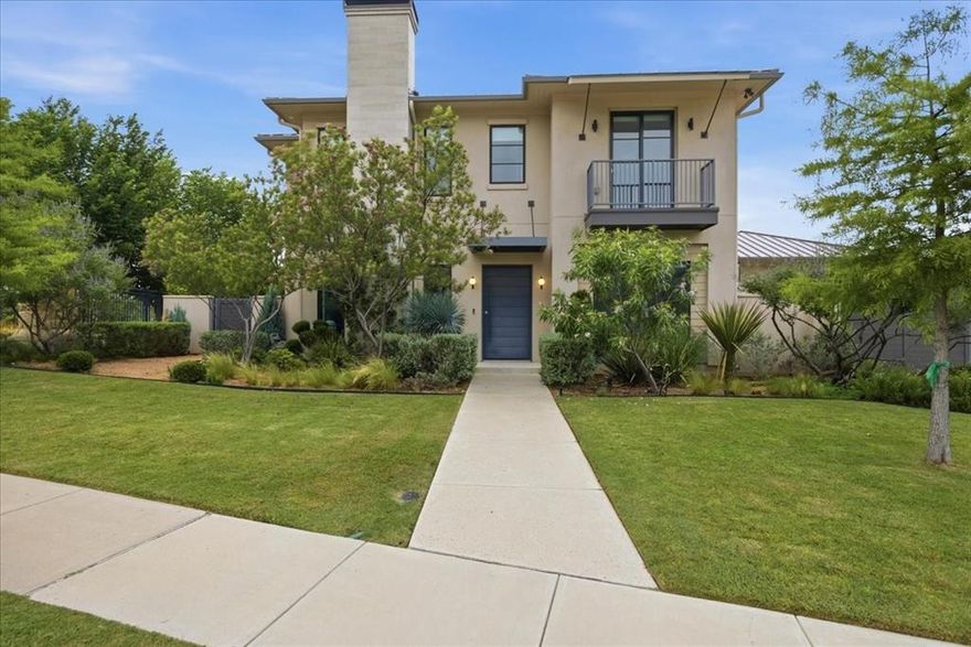 Set on a beautifully maintained lot in Riverhills Phase 3, 3856 Bent Elm Lane offers a clean, modern aesthetic paired with a highly functional layout in one of Fort Worth’s most desirable areas. Ideally positioned just a short drive to Fort Worth Country Day and Waterside, the home brings together thoughtful design, generous scale, and a strong sense of livability. Spanning 4,377 square feet, the home features 6 bedrooms and 4.1 baths, with flexible spaces that adapt easily to a variety of needs. Light-filled living areas anchor the main level, highlighted by a sleek fireplace, built-ins, and expansive sliding doors that open directly to the backyard—creating a seamless extension of the living space. The kitchen is both striking and streamlined, centered around a substantial island with seating and complemented by custom cabinetry, a clean-lined range surround, and a dedicated dining area overlooking the pool. The open flow makes it equally suited for hosting or day-to-day use. A dedicated fitness room is thoughtfully positioned on the first floor just off the garage, offering a convenient and private space for workouts or additional flex use. Upstairs and secondary living areas provide additional versatility, while the overall layout maintains a comfortable balance between open gathering spaces and more private retreats. Outdoors, the backyard is designed for both relaxation and entertaining, with a covered patio, multiple seating areas, and a pool framed by clean landscaping and privacy. A well-executed home in a prime location, 3856 Bent Elm Lane delivers a compelling combination of design, functionality, and convenience.