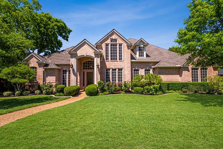 Situated on nearly half an acre in Keller's desirable Courts of Canterbury Forest neighborhood, this beautifully updated home offers an exceptional blend of luxury, comfort, and everyday livability. A spacious, well-designed floor plan welcomes you with multiple living areas, ideal for both relaxed family living and effortless entertaining. Two of the three living areas are enhanced by their own fireplaces, creating warm and inviting gathering spaces. The chef-friendly kitchen opens to the main living area and features an island, ample cabinetry, and generous granite counter space, creating a natural gathering spot for family and friends. A formal dining room and bright breakfast area add flexibility for everyday meals or special occasions.  The oversized primary suite is a true retreat, featuring private access to the backyard and pool, a spa-inspired bath with dual vanities, soaking tub, walk-in shower, and a large walk-in closet. A secondary bedroom with a full bath on the main level provides the perfect space for guests, extended family, multi-generational family, or a home office. Upstairs offers two spacious bedrooms connected by a Jack-and-Jill bath, along with a large bonus room ideal for a game room, media space, studio, or playroom. Step outside to your private backyard oasis, complete with a sparkling pool and spa—perfect for Texas. Manicured landscaping surrounds the space, while a full synthetic turf system provides year-round beauty with minimal maintenance. This exceptional home delivers resort-style outdoor living, elegant interiors, and family-friendly versatility in one of Keller’s most sought-after locations.